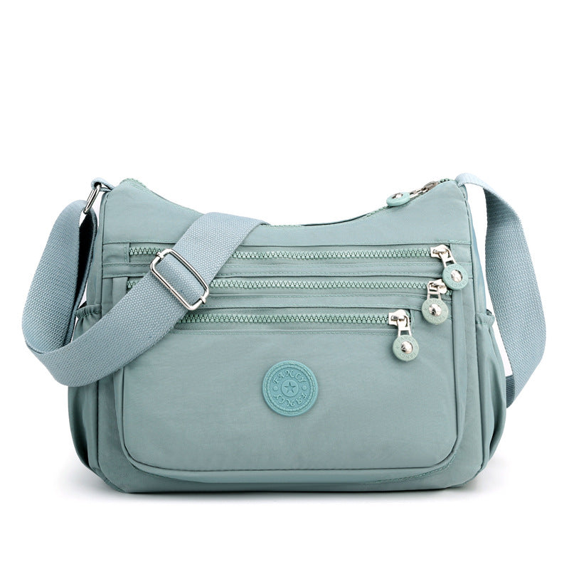 Elegant Chain-Adorned Crossbody