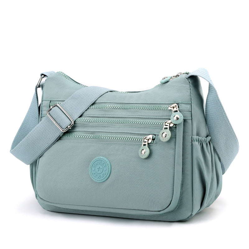 Elegant Chain-Adorned Crossbody
